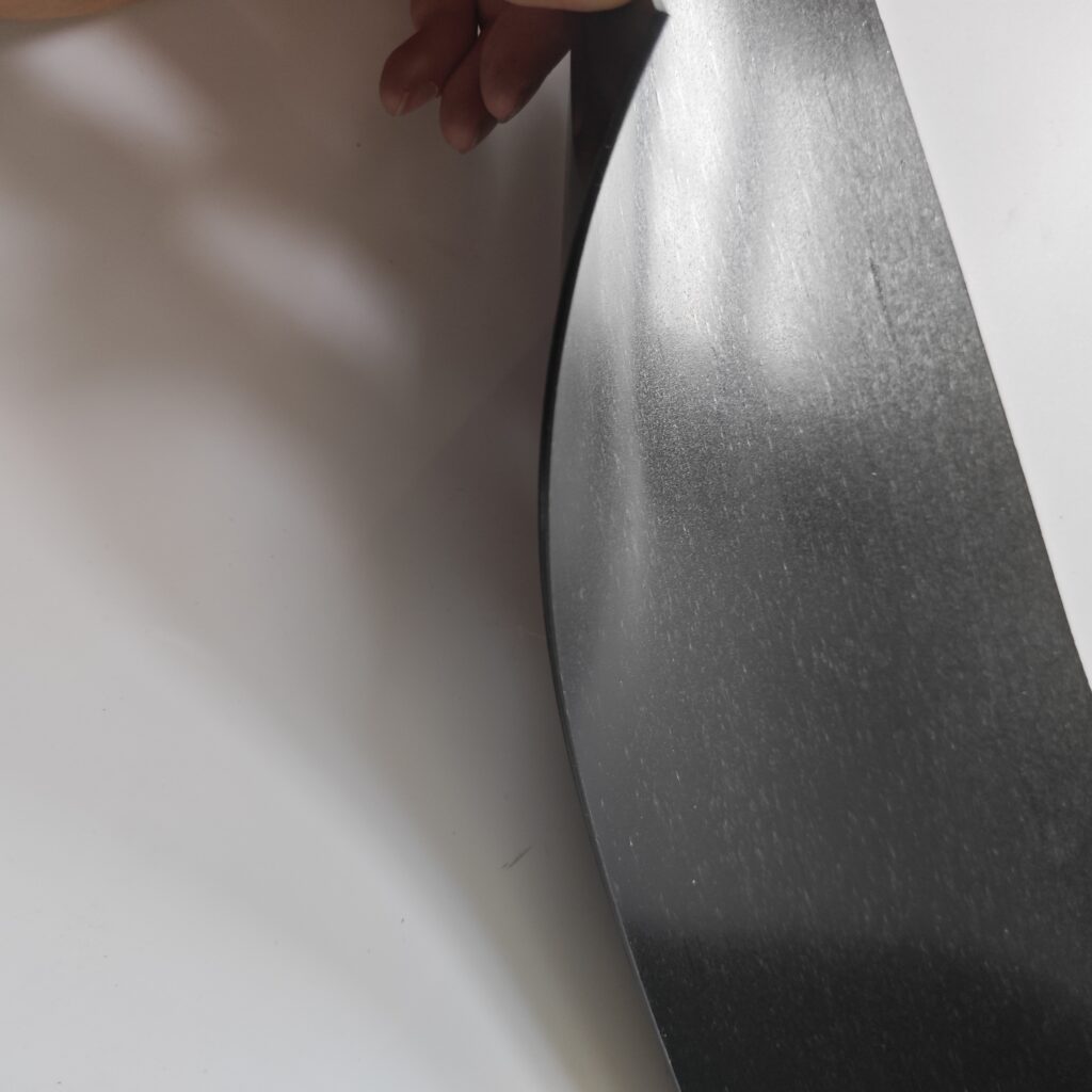 Close view of the surface and backing of CJSD heat shrinkable wrapping tape