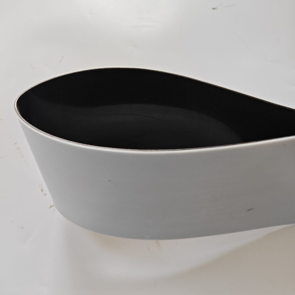 CJSD polyethylene composite tape showing backing and adhesive layers