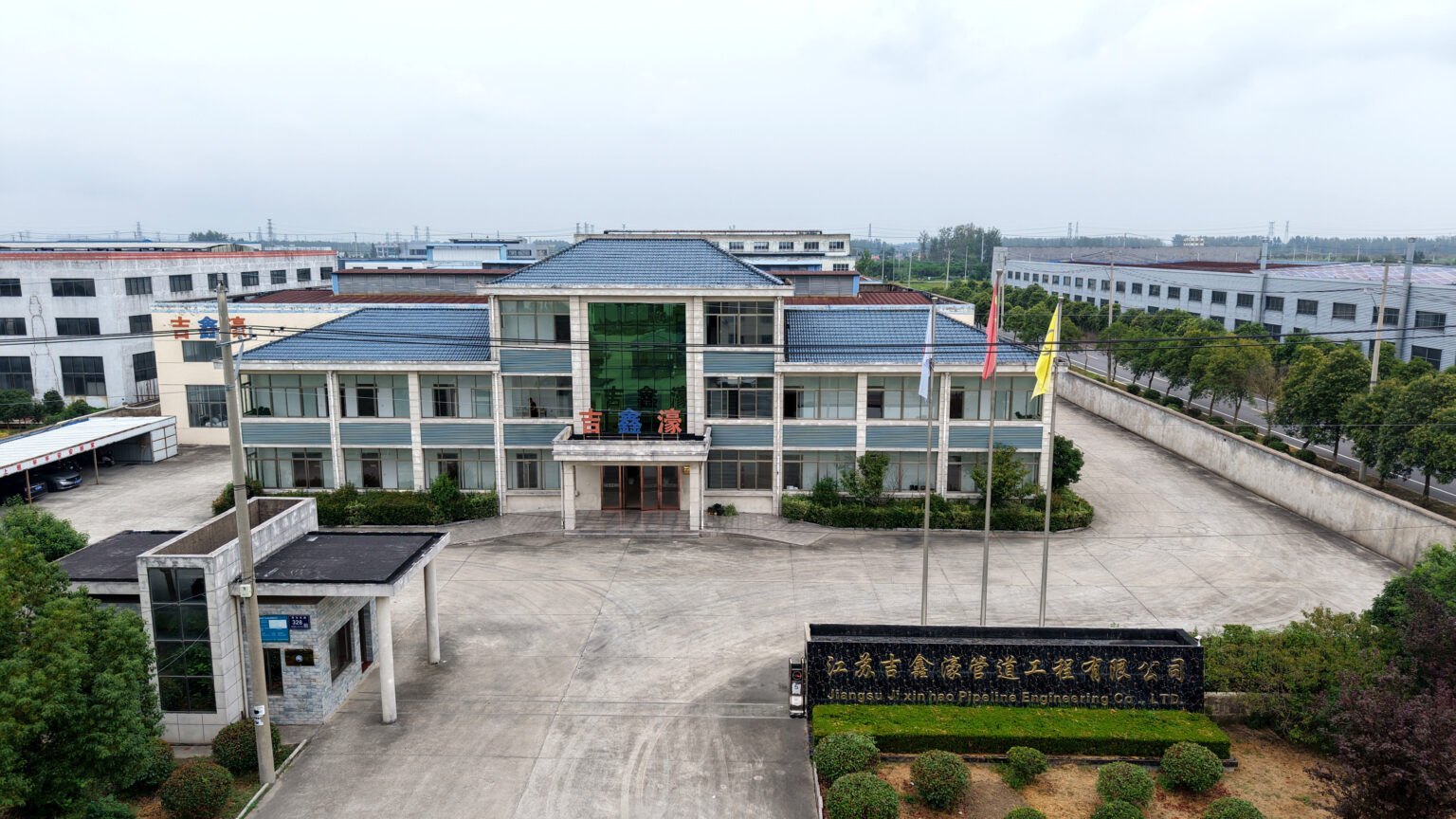 Elevated view of Jiangsu Jixinhao office building and factory courtyard